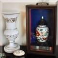 P12. Porcelain vase in shadow box. 